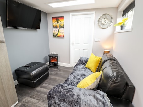 Cottage | Living area. Lockdown Lodge