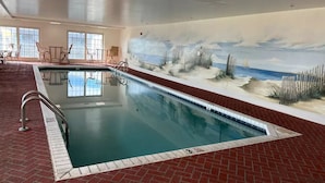 An indoor swimming pool with a mural of a beach scene on the wall. - Luxury 3BR, 4BA Oasis: Beach is 2 blocks away, Indoor Pool, sleeps 8! Waterfront (Ocean City)