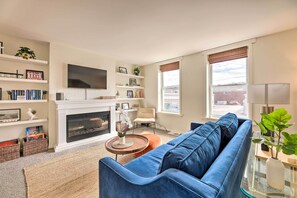 TV, fireplace, books, music library