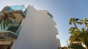 A modern building with a sign reading 'DATA SOL'.