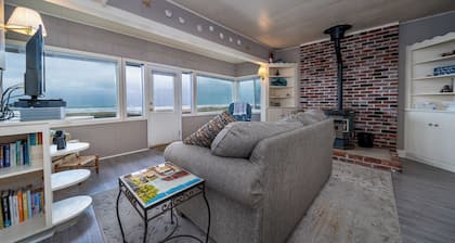 Steps to the Beach, Charming Oceanfront Bungalow with Deck and Ocean Views