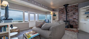 Steps to the Beach, Charming Oceanfront Bungalow with Deck and Ocean Views