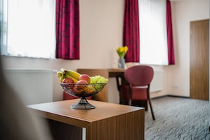 Family Double Room | Living area | Flat-screen TV