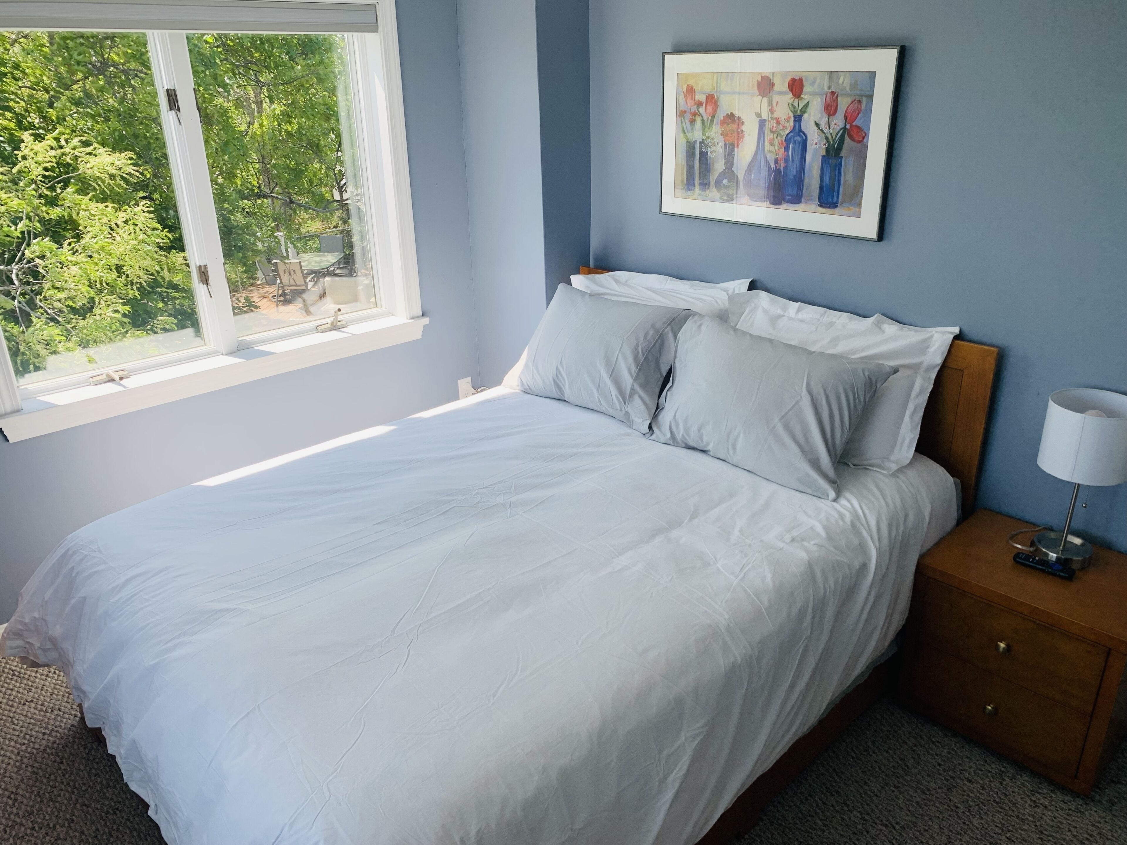 Sun filled condo. Water, dune & monument views, quiet respite, private parking!!