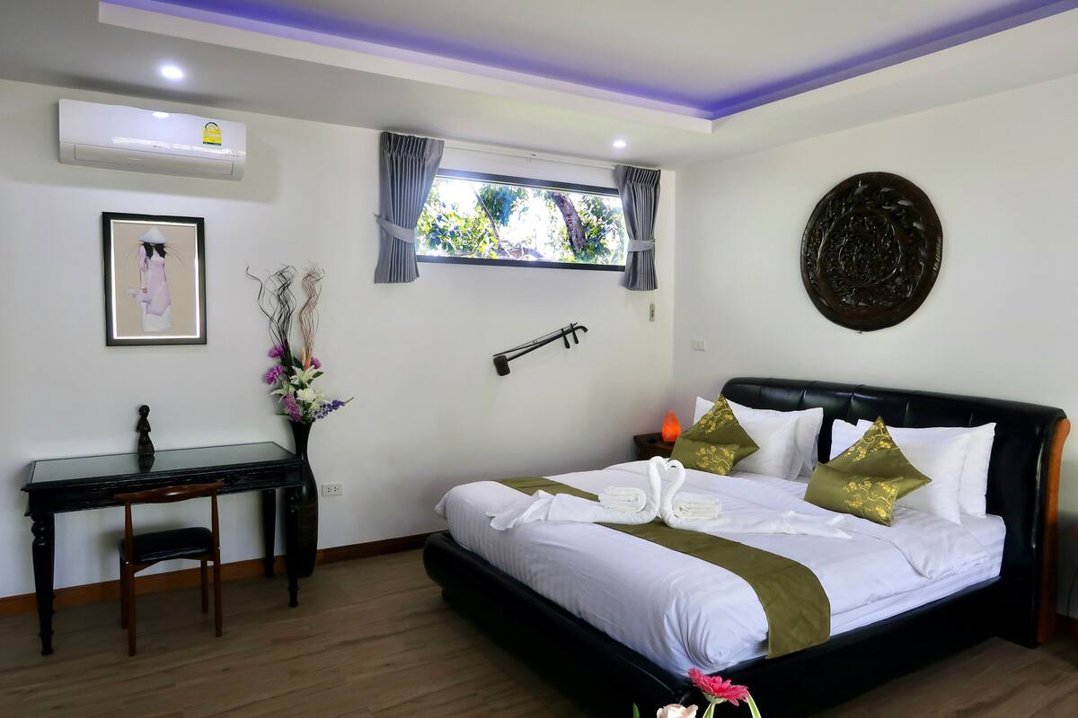 Premium bedding, memory foam beds, in-room safe, laptop workspace