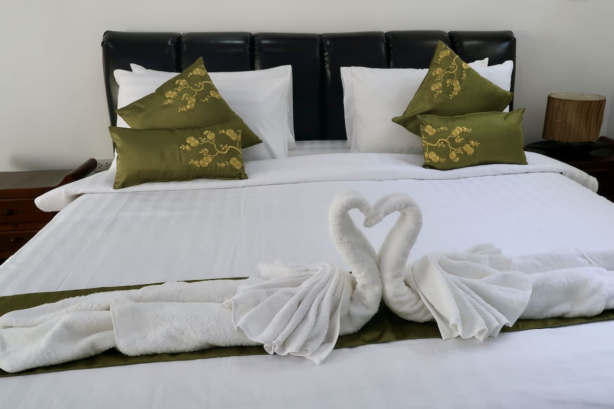 Premium bedding, memory foam beds, in-room safe, laptop workspace