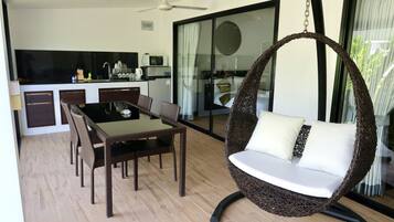 Family Villa | Living area | 43-inch Smart TV with cable channels, TV