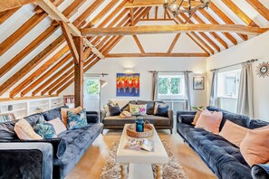 Smart TV, fireplace, table football, books
