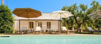 Typical stone structure with private swimming pool a few steps from the town