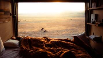 1 bedroom, travel crib, bed sheets