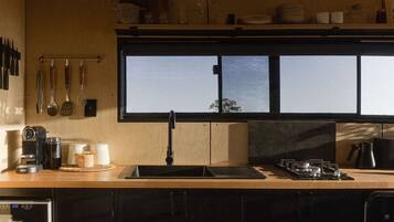 Fridge, stovetop, coffee/tea maker, cookware/dishes/utensils