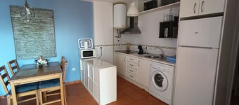 Low naturist house with patio on the beachfront with community pool!
