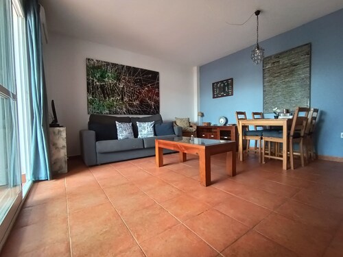 Low naturist house with patio on the beachfront with community pool!