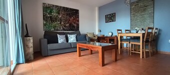 Low naturist house with patio on the beachfront with community pool!