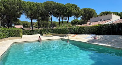 Chalet in a shady residence with swimming pool