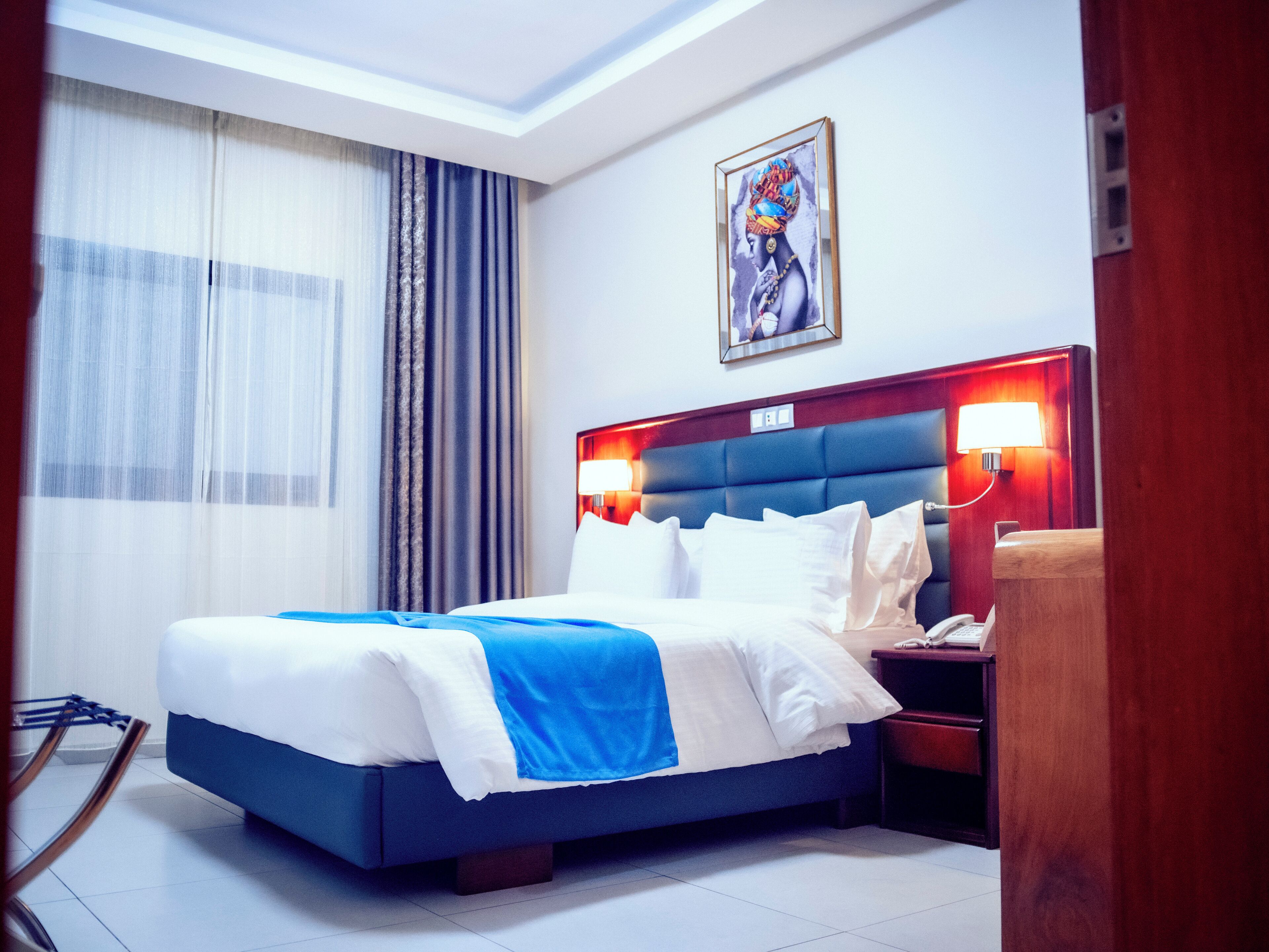 Deluxe Room | Premium bedding, minibar, in-room safe, individually decorated