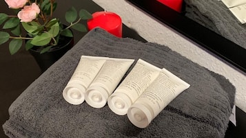 Hair dryer, towels, soap, shampoo