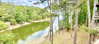 80BPD, Four bedroom, two 1/2 bath log-sided condo with lake view , garage by RedAwning