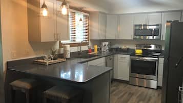 Condo, 2 Bedrooms | Private kitchen | Fridge, oven, coffee/tea maker, toaster