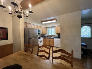 Private kitchen - Lake view two bedroom, two bath Harbor North luxury cottage with private hot tub overlooking Lake Ouachita. by RedAwning (Mount Ida)