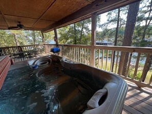 Cottage, 2 Bedrooms | Outdoor spa tub - Lake view two bedroom, two bath log-sided cottage with private hot tub overlooking Lake Ouachita. by RedAwning (Mount Ida)