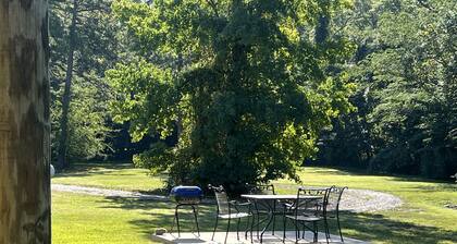 Queen Guest Room located at the Joplin Inn at the entrance to Mountain Harbor,, just 2 1/2 miles from Lake Ouachita. by RedAwning