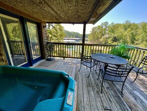 Cottage, 2 Bedrooms | Outdoor spa tub - Luxury, loft, log-sided two bedroom Harbor North cottage on Lake Ouachita. by RedAwning (Mount Ida)