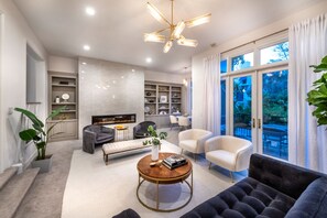 TV, fireplace - Reef Mall - Contemporary Mediterranean Estate with Spectacular Mountain Views (Los Angeles)