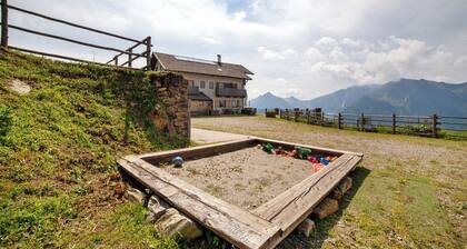Casa de vacaciones "Enzianhuette" con vistas a la montaña, 3 balcones y terraza compartida