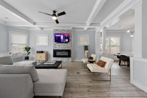 Smart TV, fireplace, table football, books