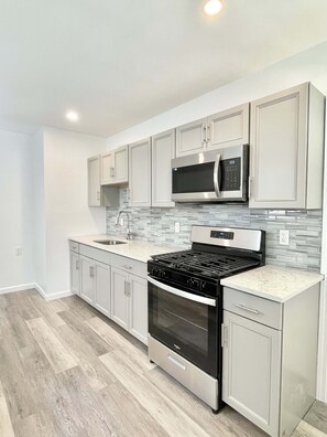 Fridge, microwave, oven, stovetop - Newly Renovated Baseball Townhouse (Oneonta)