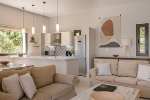 Comfort Villa | Living area | 42-inch Smart TV with digital channels, TV, fireplace