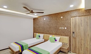 Standard Room | Desk, iron/ironing board, bed sheets - Treebo Usha Vasivi Alipiri Road, 2 Km From Tirupati Central Bus Station (Tirupati)