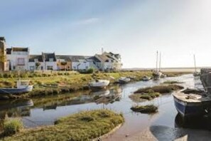 Enjoy a serene riverside retreat with a tranquil atmosphere and access to the water.