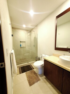 Shower, hair dryer, towels, soap