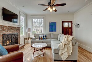 Smart TV, fireplace, books