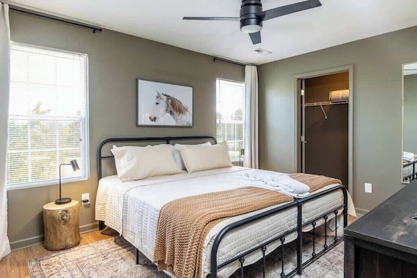 Our master bedroom includes a TV for your viewing pleasure and a dresser for unpacking during your stay