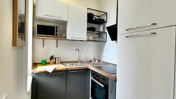 Apartamento familiar | Cocina privada | Frigorífico grande, microondas, horno y placa de cocina