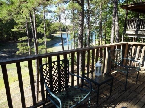 80BPD,  Four bedroom, two 1/2 bath log-sided condo with lake view , garage by RedAwning