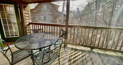 Forest View two bedroom, two bath Harbor North luxury loft cottage with private hot tub o Lake on Ouachita. by RedAwning