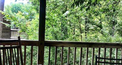 Forest View two bedroom, two bath Harbor North luxury loft cottage with private hot tub o Lake on Ouachita. by RedAwning