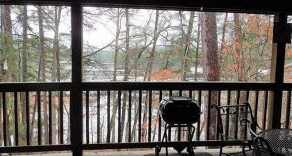 Lake view three bedroom, three bath cottage with private hot tub overlooking Lake Ouachita. by RedAwning
