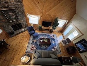 Fireplace, books - Lake view two bedroom, two bath loft,  log-sided cottage with private hot tub overlooking Lake Ouachita. by RedAwning (Mount Ida)