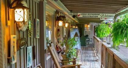 Queen Guest Room located at the Joplin Inn at the entrance to Mountain Harbor, just 2 1/2 miles from Lake Ouachita. by RedAwning