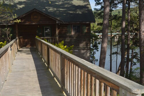 Two bedroom, two bath, log-sided, luxury Harbor North cottage overlooking Lake Ouachita. by RedAwning