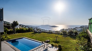 Outdoor pool, pool umbrellas, pool loungers