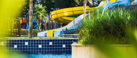 A water park with slides and a pool.