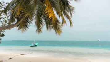 On the beach, white sand