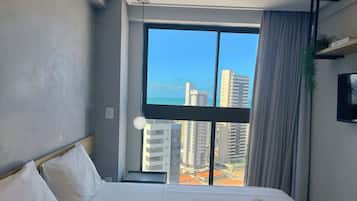 Apartamento | Wi-Fi de cortesia, roupa de cama