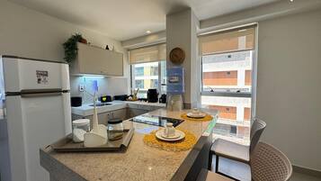 Apartamento exclusivo | Cozinha privada | Frigobar, micro-ondas